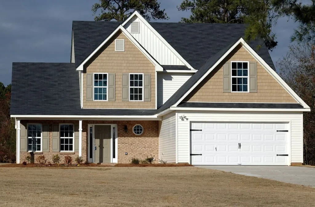 Two-story suburban house with a white garage door